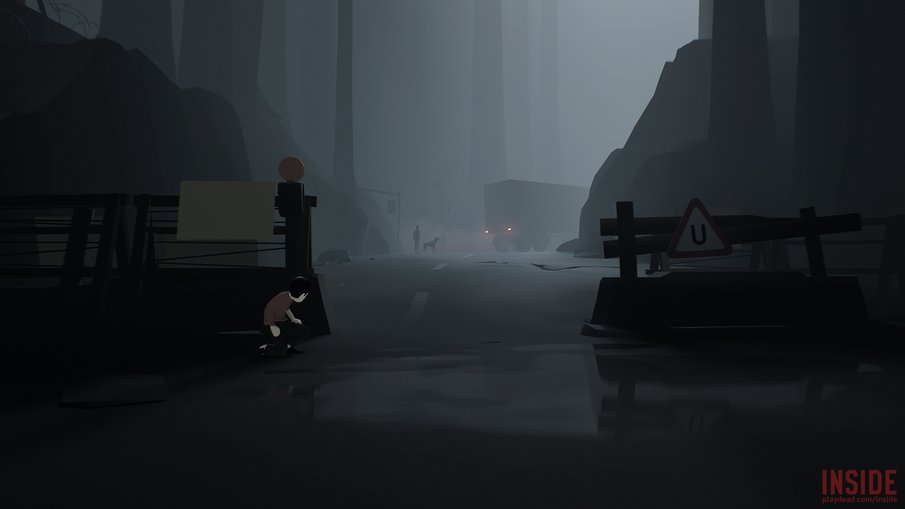 The main character in 'Inside' sneaking over a dark forest road.