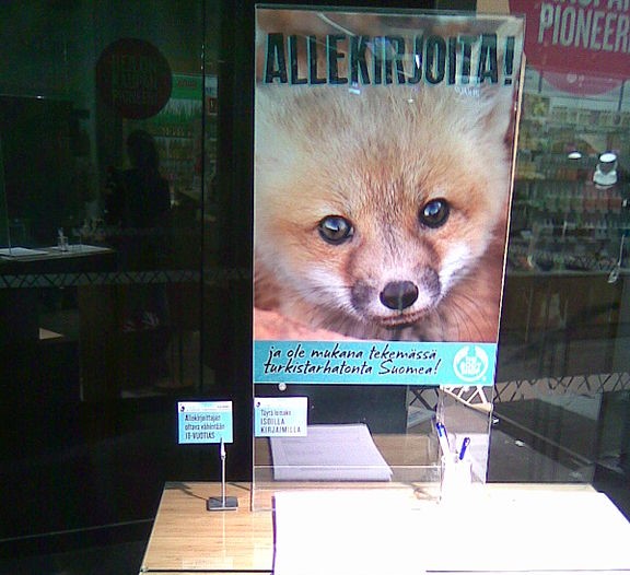 A poster of a fox