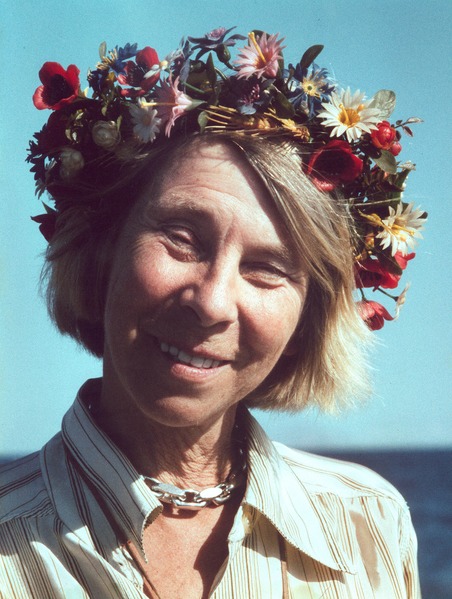 Finnish author Tove Jansson, portrayed wearing a flower crown, 1967.