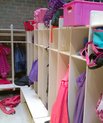 Kindergarten wardrobe, lots of coloured jackets hanging