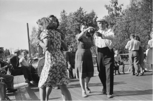 young couples having fun dancing together outside