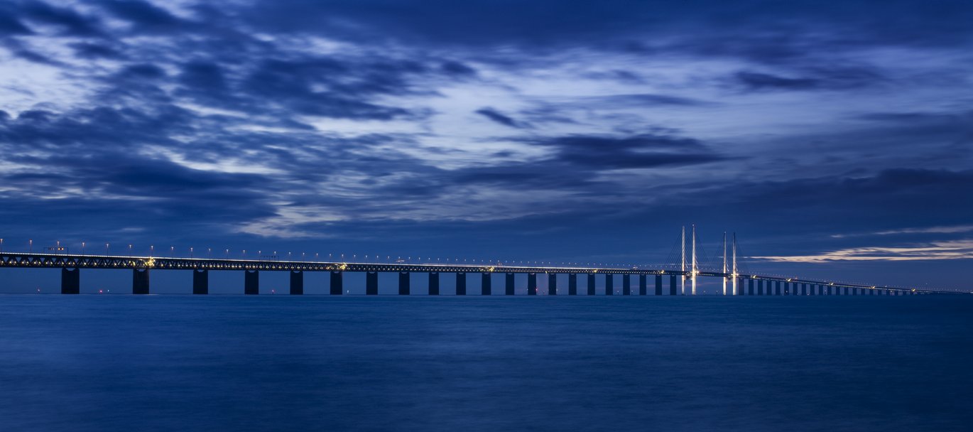Picture of the Oresund Bridge at night, the bridge stretches between Copenhagen in Denmark and Malmö.