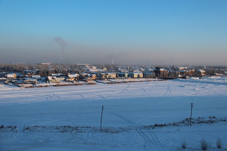 Siberia in winter. Town filled with snow