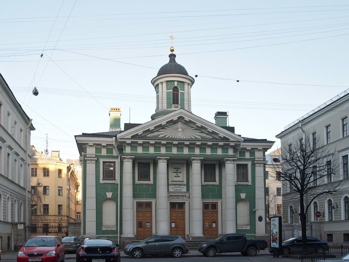 St Mary’s Lutheran Church in St Petersburg. Big building with four poles and three doors as entrances.