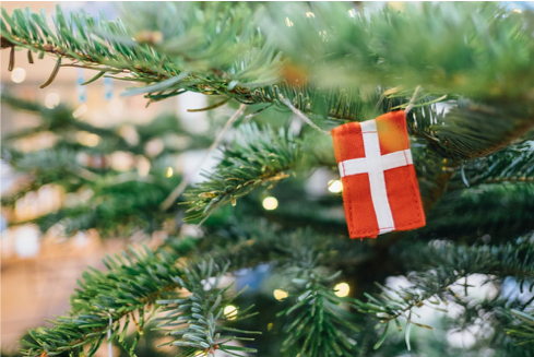 Dannebrog (the Danish flag) hanging from a christmas tree