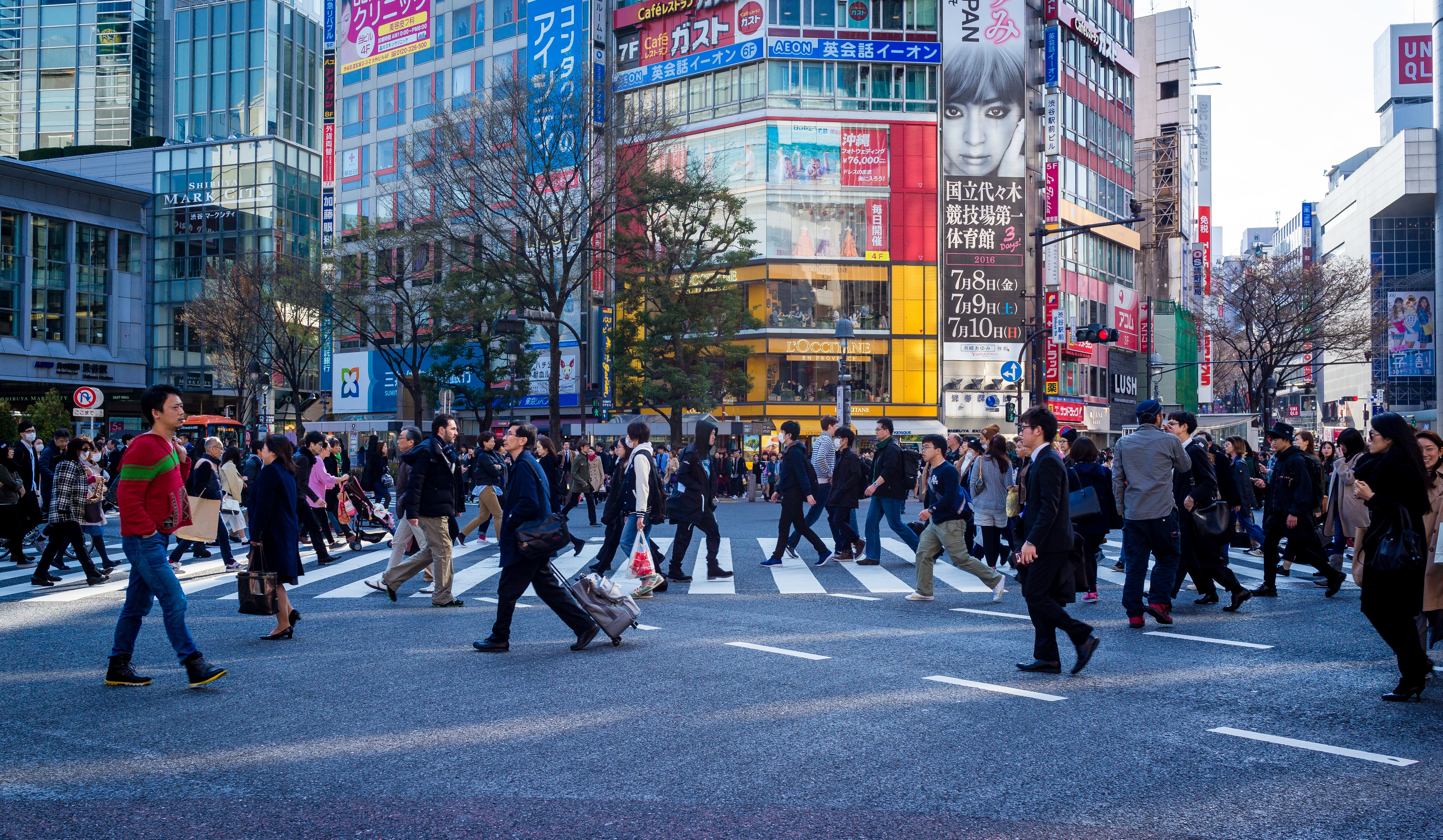 A crowd of people walking the streets of Tokyo in Japan. 